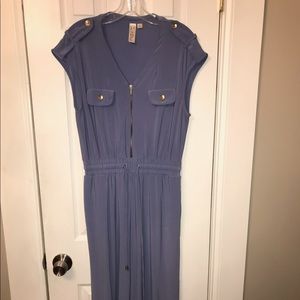 Periwinkle jumpsuit with elegant gold epaulettes, buttons & zipper.